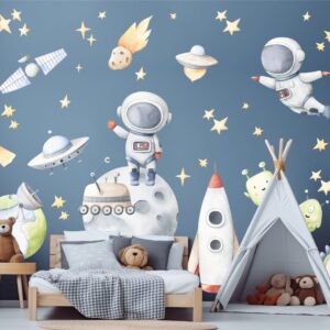 Watercolor astronaut floating among colorful planets and stars nursery wall decals