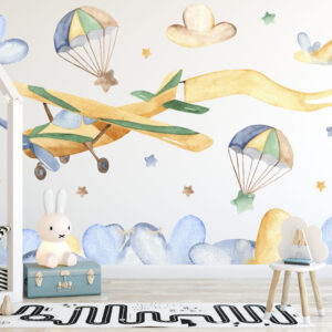 Watercolor airplanes and animals with parachutes among blue clouds wall decals